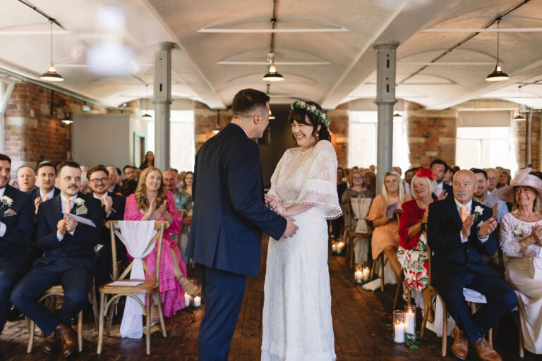 Brude and groom just married shot by documentary style wedding photographer louise barry