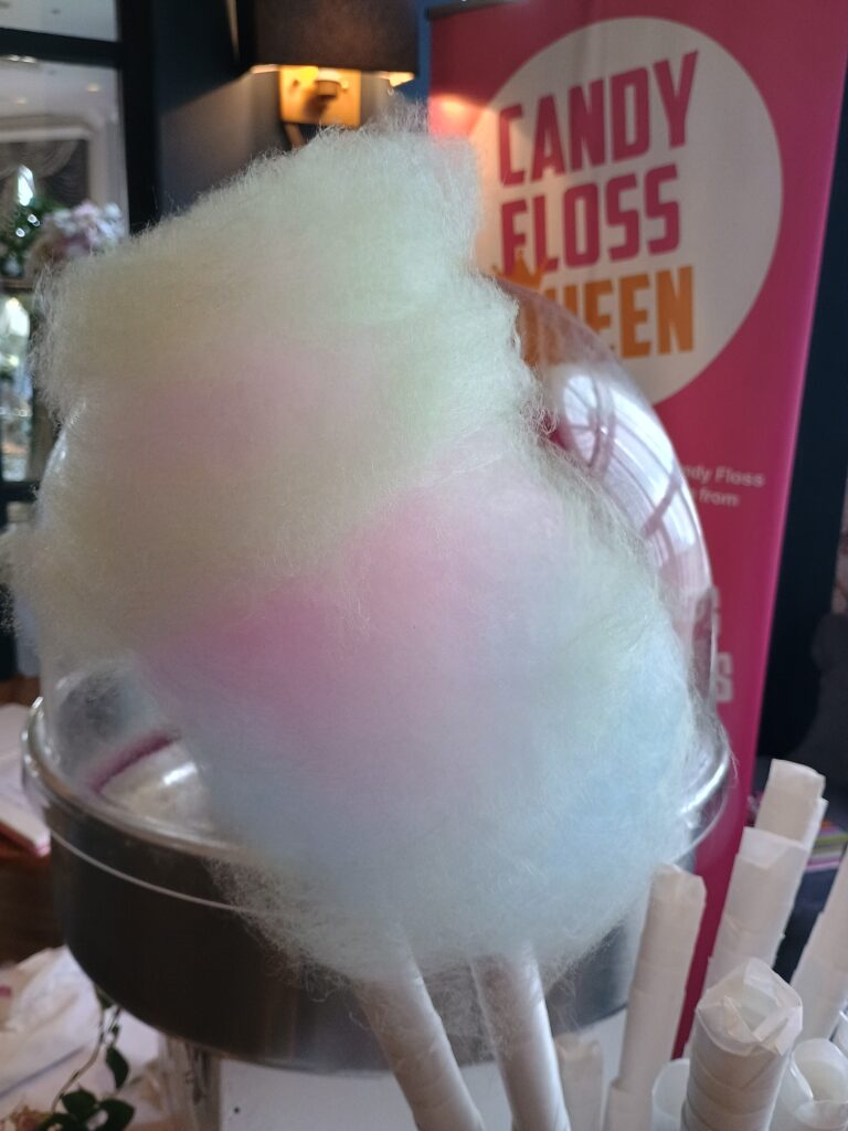 Multicoloured Candy Floss Queen! Hire Candy Floss for your event